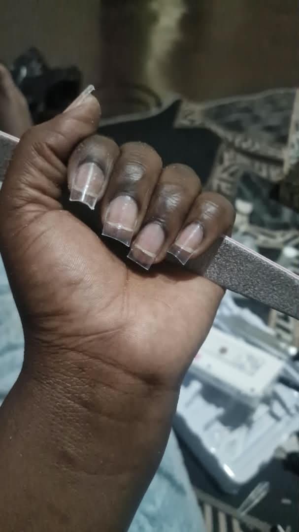 Coral French-tip manicure at Saylor Beauty Spa